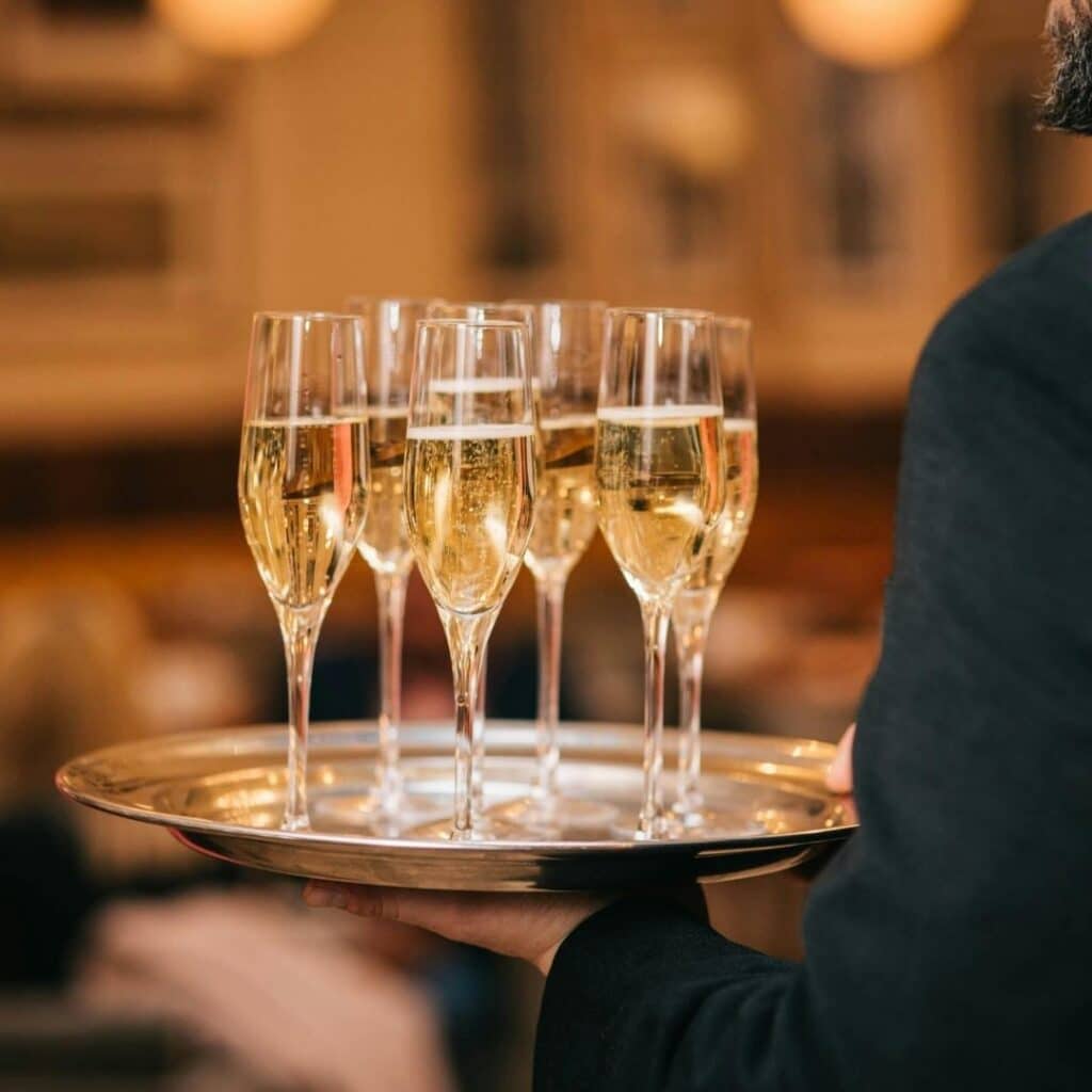 server with champagne
